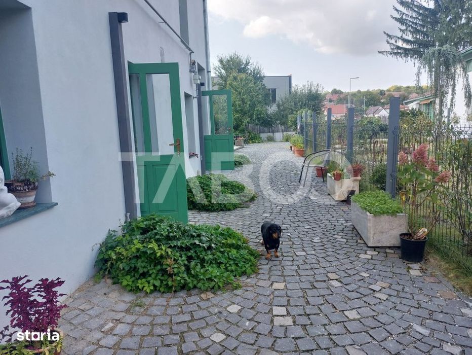 Apartament de vanzare 105 mp 3 camere curte 340 mp in acte Cisnadie