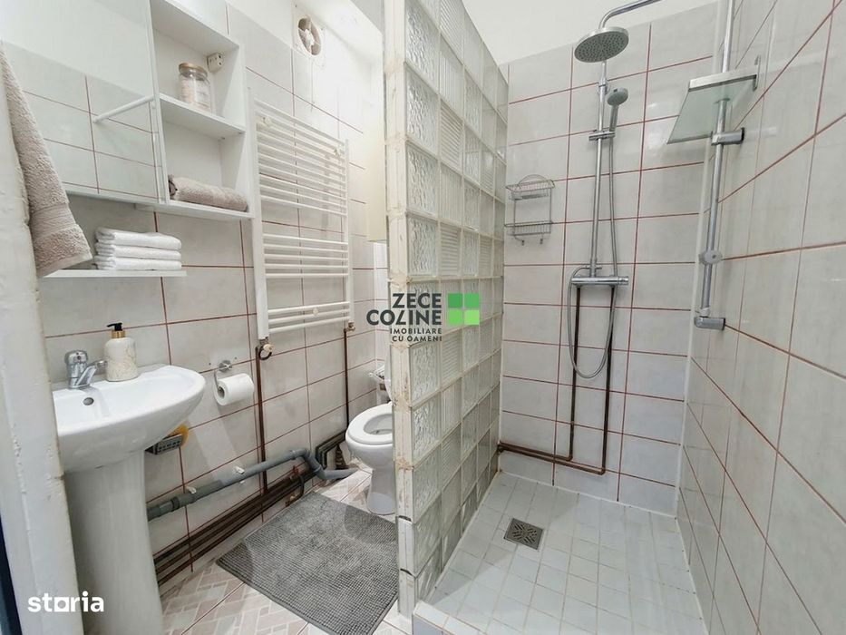 Casa Tomesti Deal la asfalt teren 1000 mp