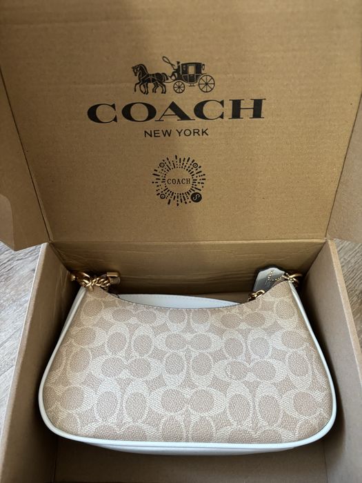 Geantă coach impecabilă