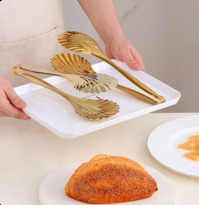Щипцы кулинарные,  кухонные.