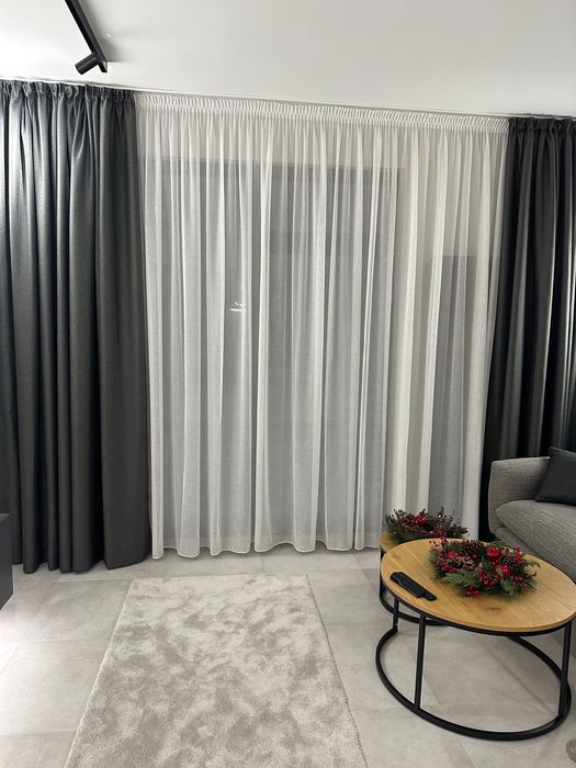 Предлага ушиване на пердета и корекций!