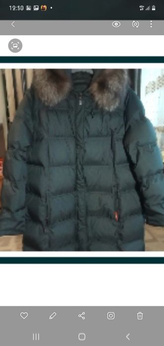 Пуховик женский.