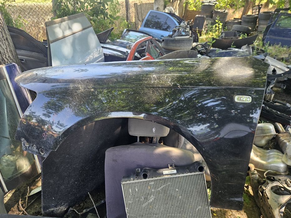 Aripa stanga fata Audi A6 C6