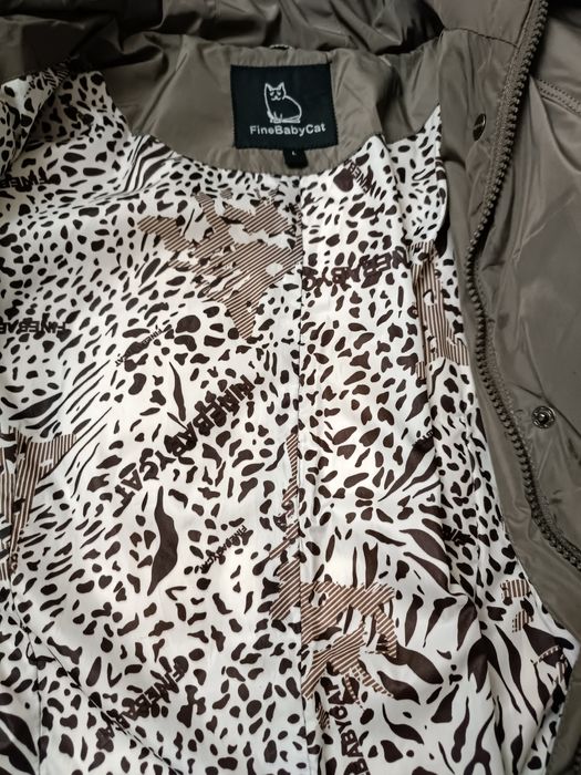 Продам пуховик серого цвета