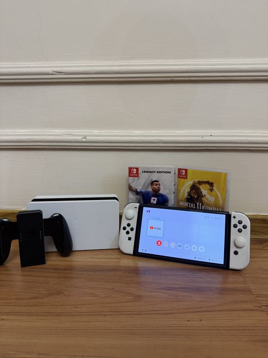 Nintendo Switch OLED белый + FIFA 23 + Mortal Kombat 11