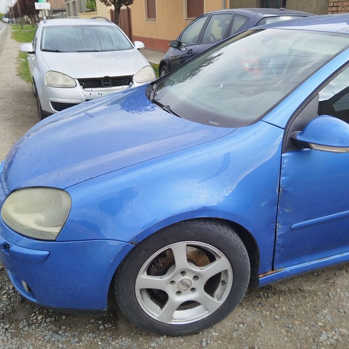 Aripa stanga/dreapta Vw Golf 5 an 2003-2008