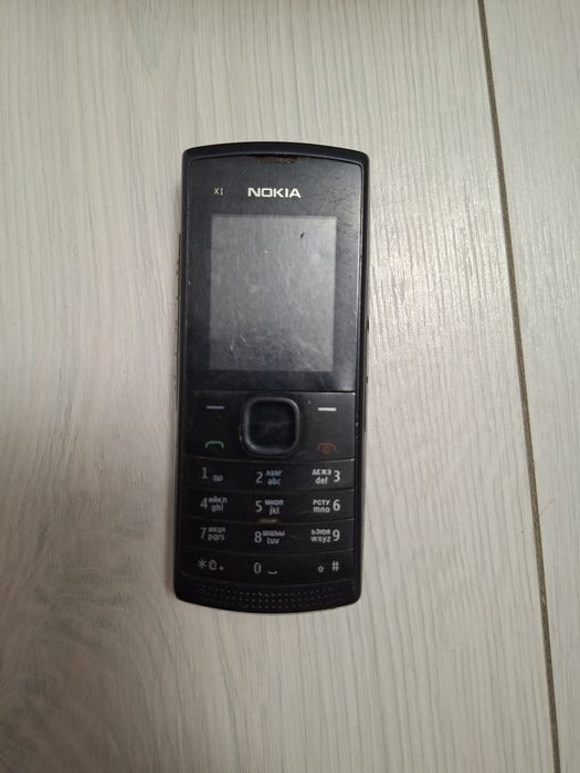 Телефон кнопочный