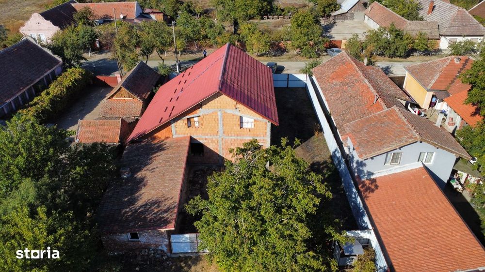 Casa individuala la rosu, intabulata - Uliuc - Sacosu Turcesc