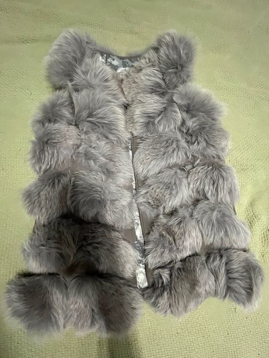 Продам меховую жилетку