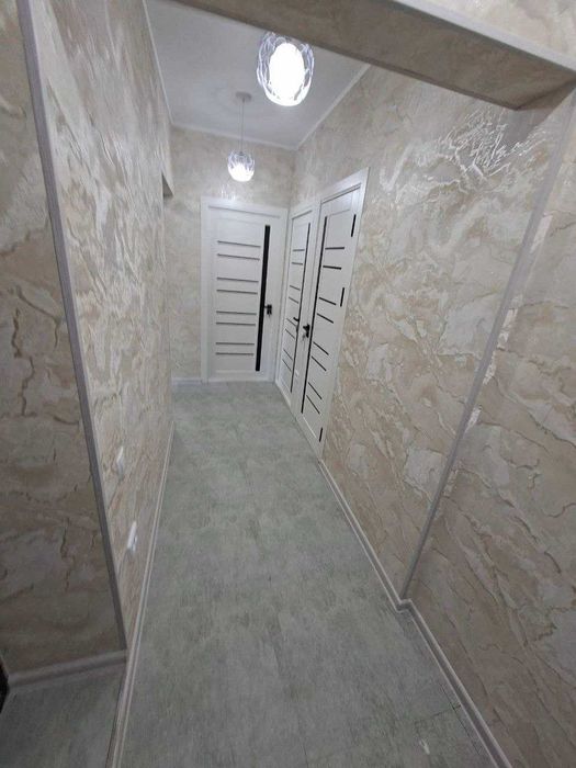 Продам квартиру 4 комнатная переделанная в 5 комнатную