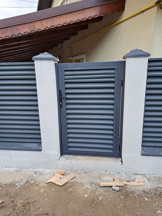 Executăm porți la comanda clientului din lamele executăm porți din șipcă metalică executăm porți din tablă decupată executăm porți din tablă cutată ex