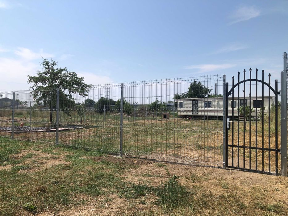Teren intravilan 500 mp cu casa mobila