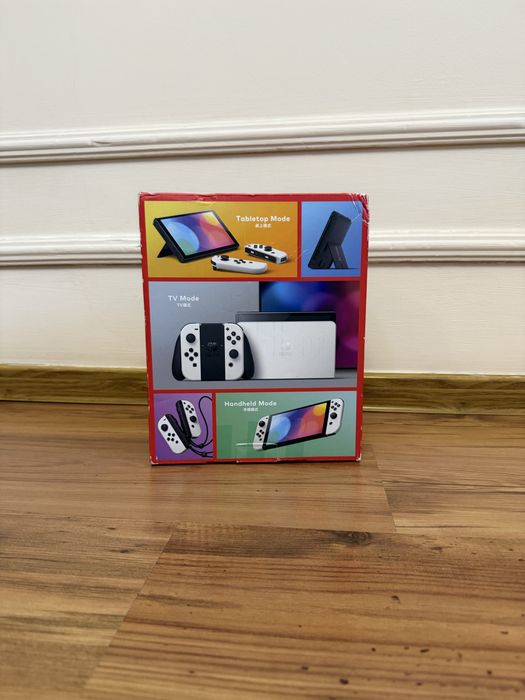 Nintendo Switch OLED белый + FIFA 23 + Mortal Kombat 11