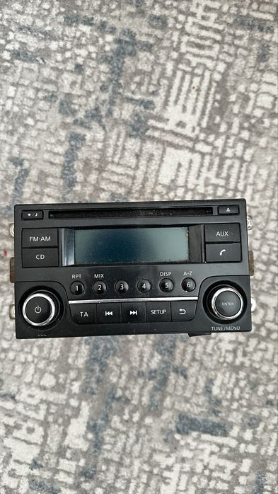 Продам оригинал магнитолу на ниссан