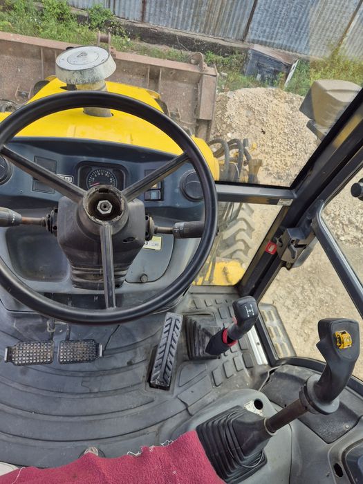 Buldoexcavator New holland an 2006