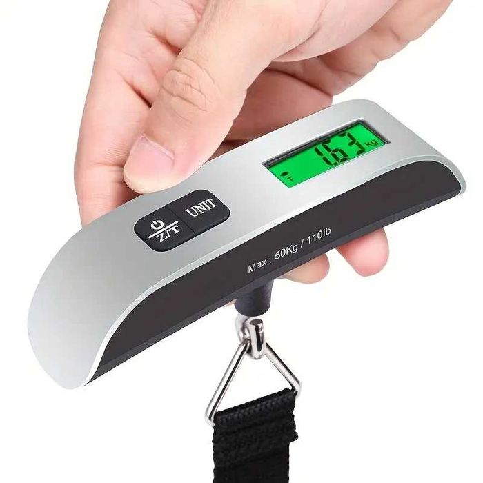 Cantar bagaje de mana piata pescuit afisaj LCD iluminat verde 1g-50kg. Functie tara dimensiune 12.5 x 2.8 x 2.8 cm dimensiune curea 22.4 cm Pret 20lei