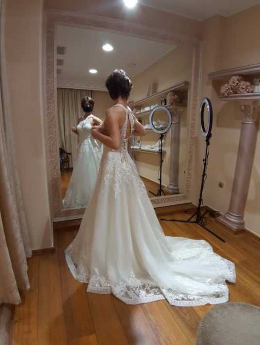 Булчинска рокля от Романтика Фашън