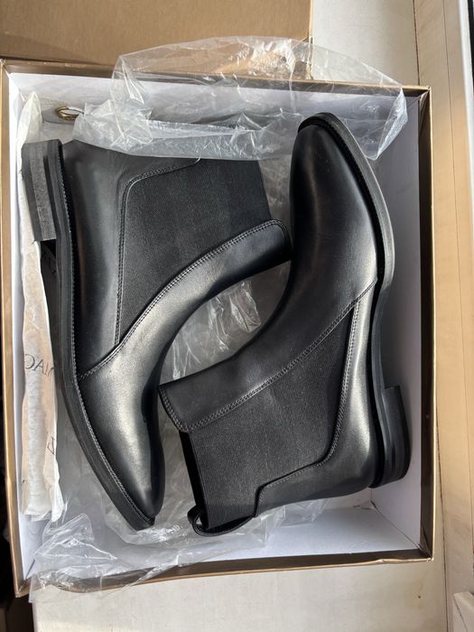 Новые женские сапоги