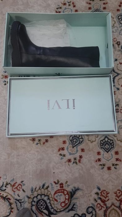 Продам сапоги новые