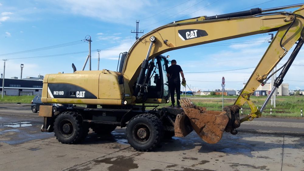 Аренда колесного экскаватора