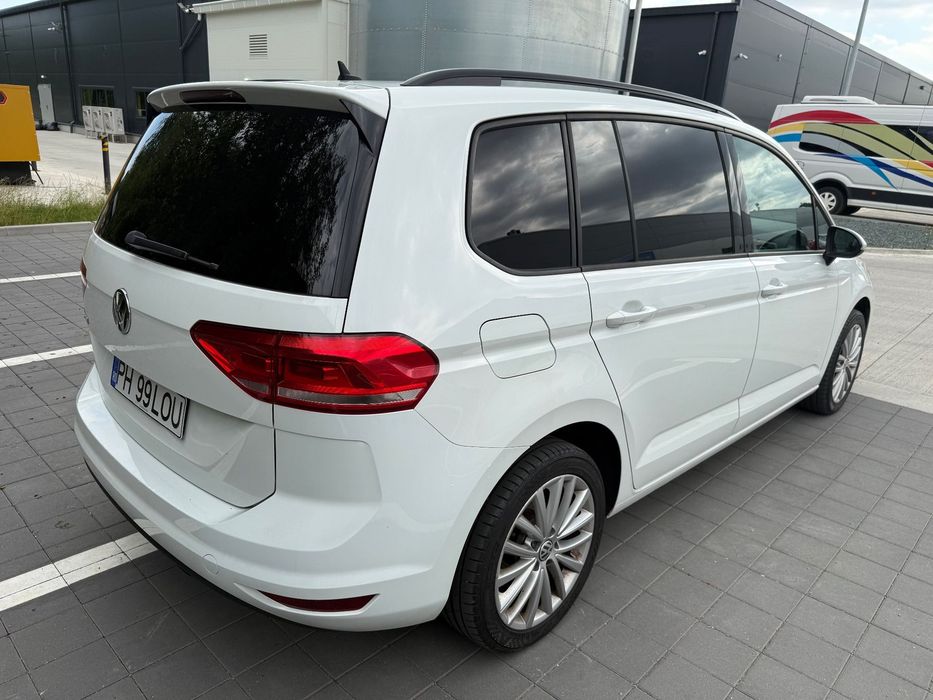 Volkswagen Touran Prim propietar cu verificare la reprezentanta km reali masina de Direc