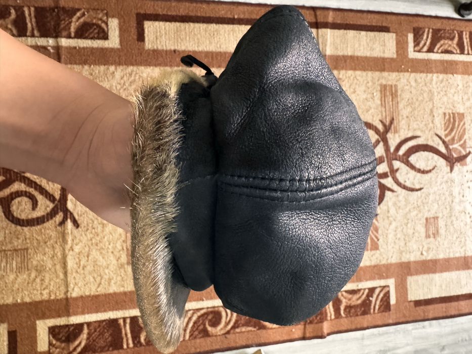 Плащи кожанные шапки