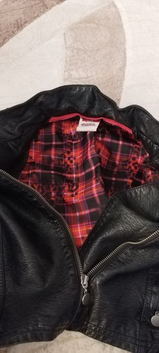 Дамски кожен елек