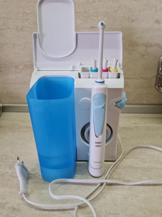 Braun water jet система за почистване на зъби