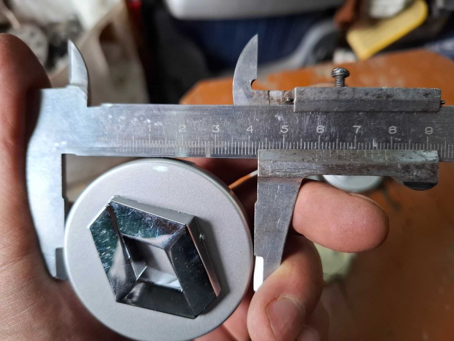 Колпачки на диск рено 59мм