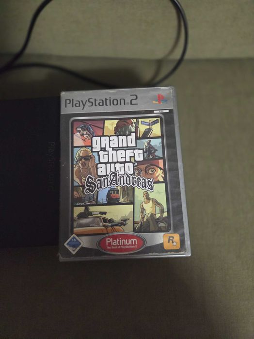 Vând PlayStation 2 Fat modat – 8 jocuri, FreeMCBoot și accesorii