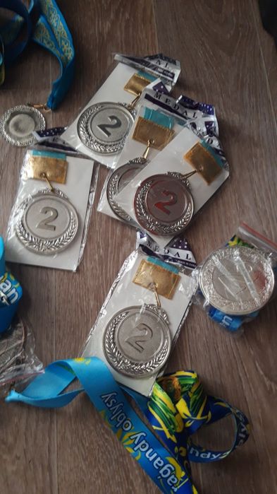 Медаль новая,город