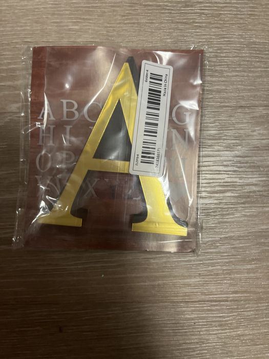 буква а, цветом золото