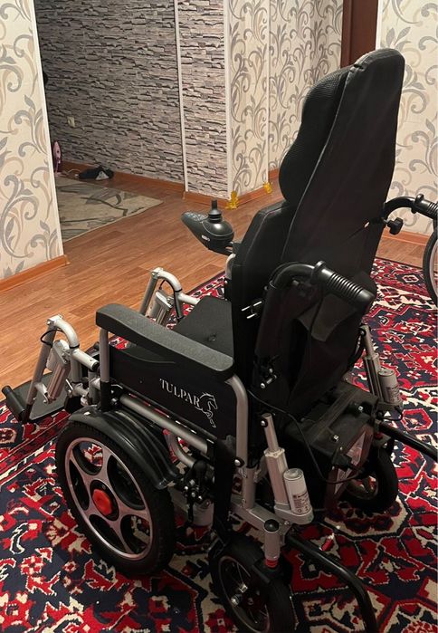 Электрическая инвалидная коляска