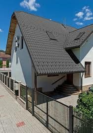 Montaj tigla metalica pret bun