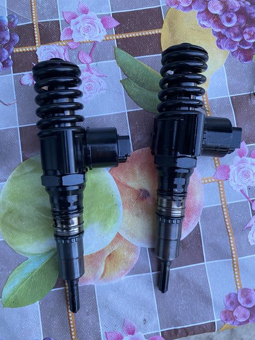 injectoare audi a6 c6 2.0 tdi cod BRE