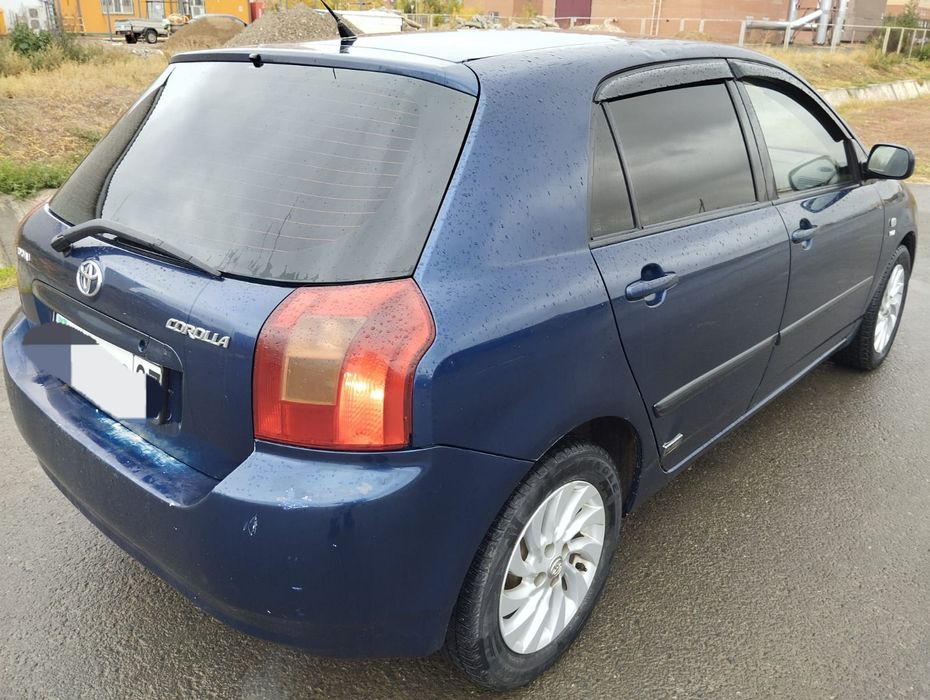 Тойота  Королла  Е120