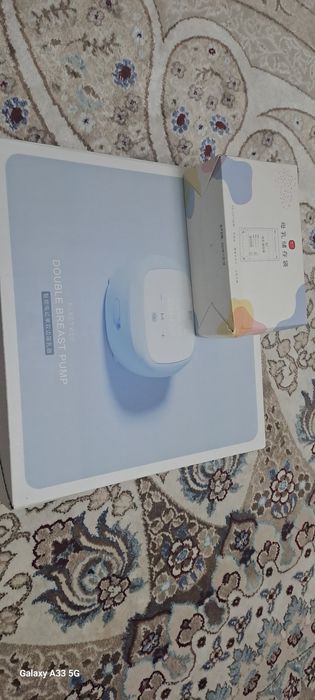 Электронной Молокоотсос