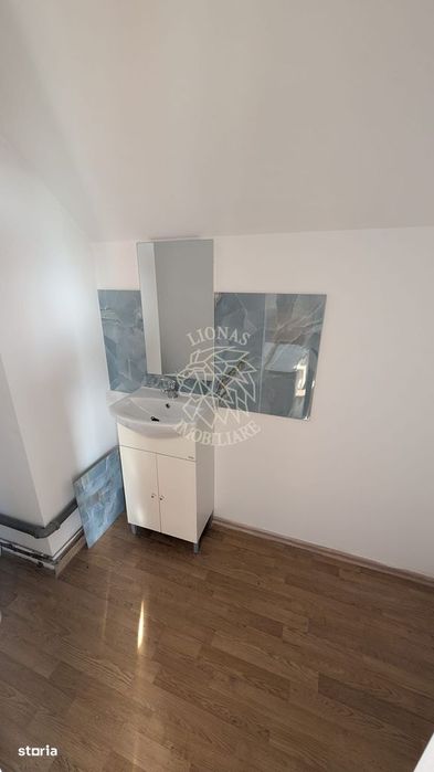 Apartament 2 camere 50 mp-2 bai-curte-parcare-Zona C. Moldovei