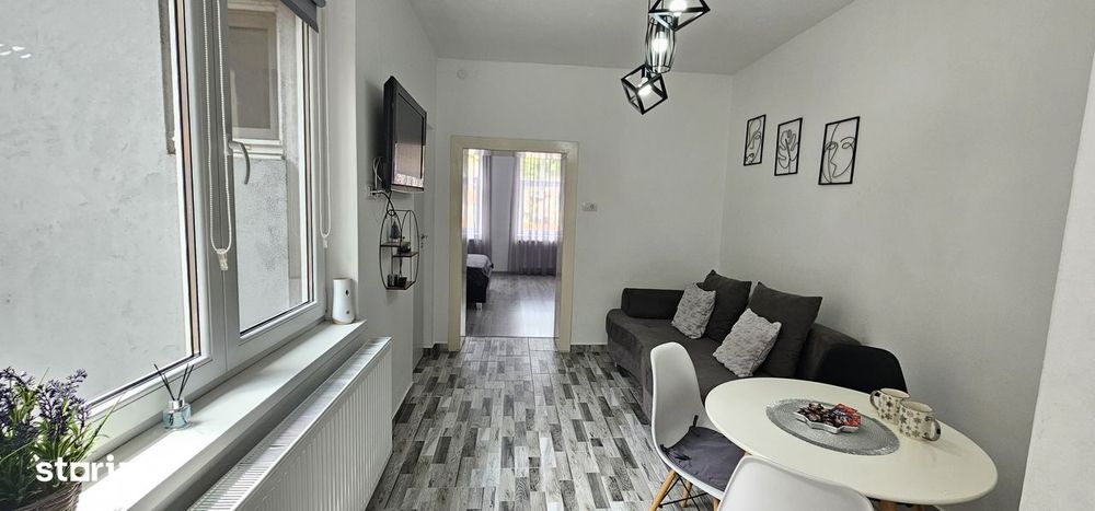 Apartament de vanzare cu terasă și beci, gata de utilizare