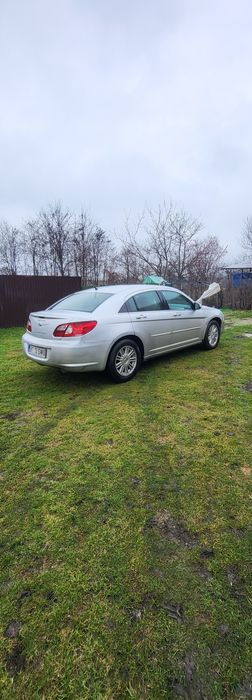 Vand schimb cu cabrio sau bmw chrysler sebring  2008