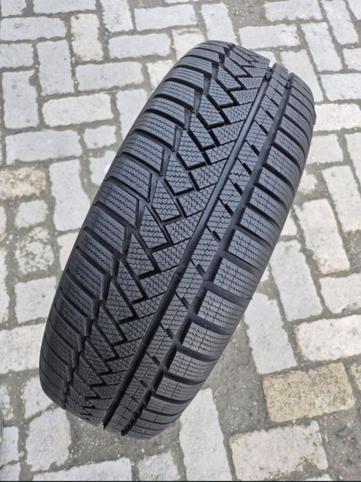 O bucată 215/60 R18 M+S iarnă - una Continental