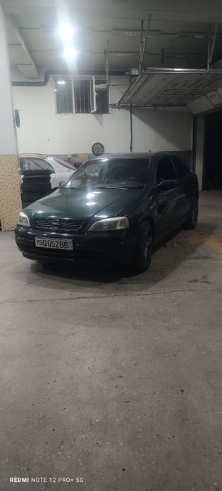 Опель Астра Дж купе