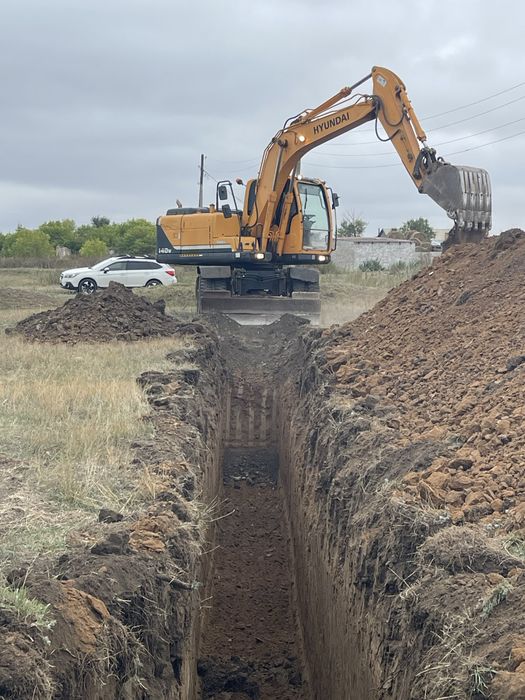 Колесный экскаватор аренда