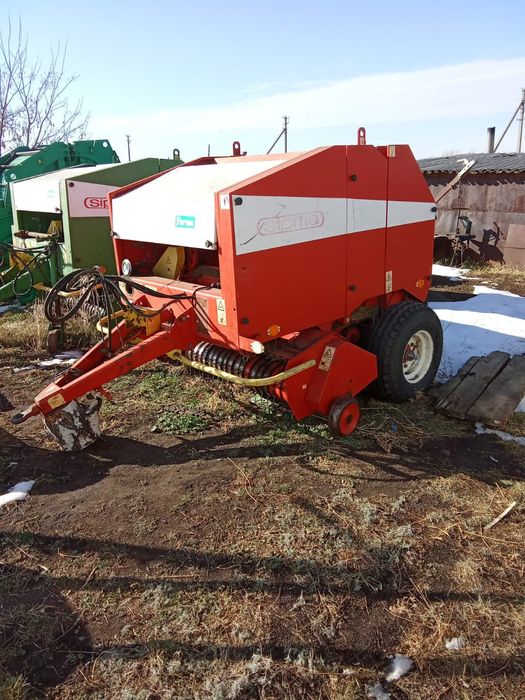 Трактор мтз 82.1 и прес
2)прес подборщик сипма