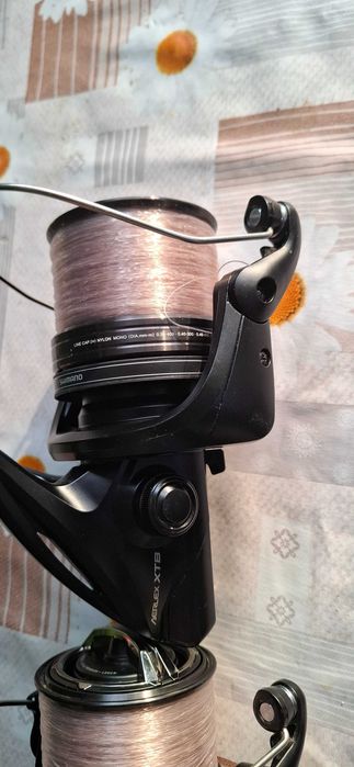 Mulinete de vinzare 2buc Shimano si 2buc Okuma