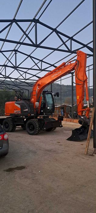 Excavator pe roti de inchiriat,sapaturi,demolari.