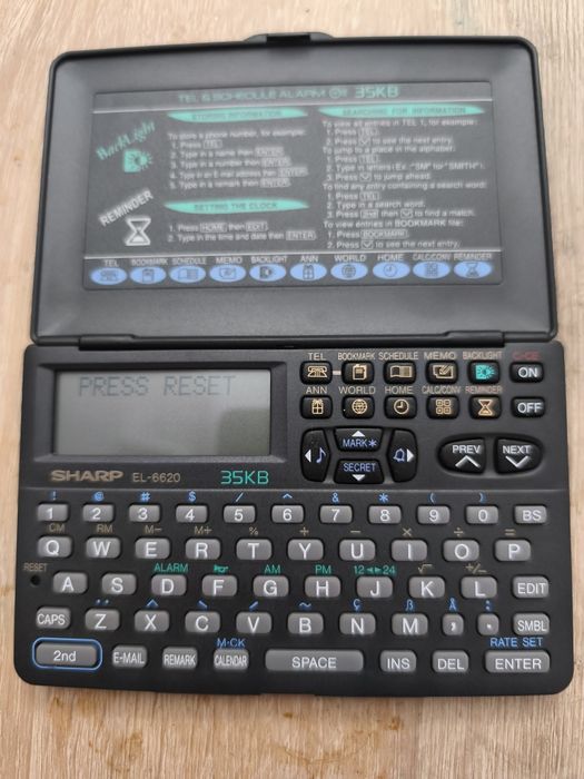 Agenda telefonică,calculator sharp