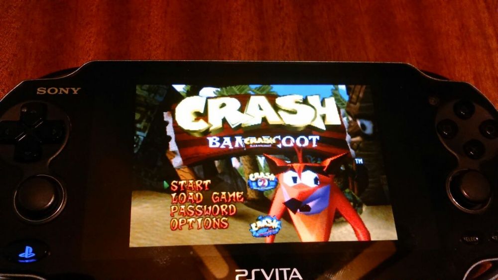 PS Vita 1004 OLED със 64 GB карта