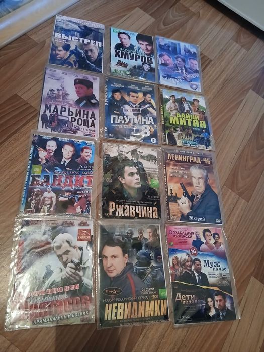 Диски DVD боевики итд.