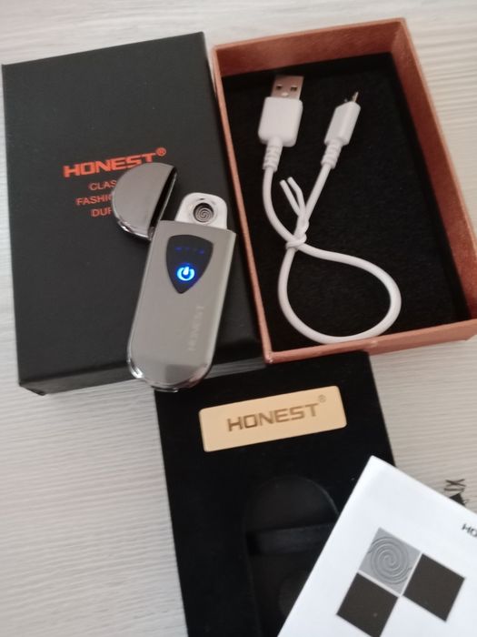 Продам оригинальную зажигалку Honest с электронной зарядкой